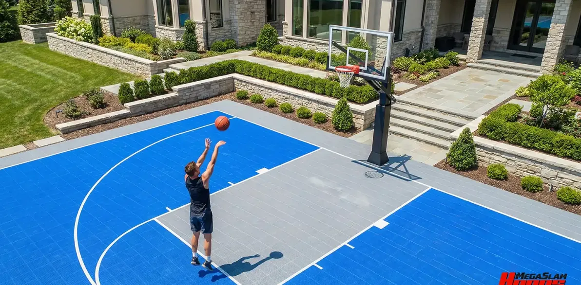 Player training on a Mega Slam XL in-ground hoop on a full home basketball court