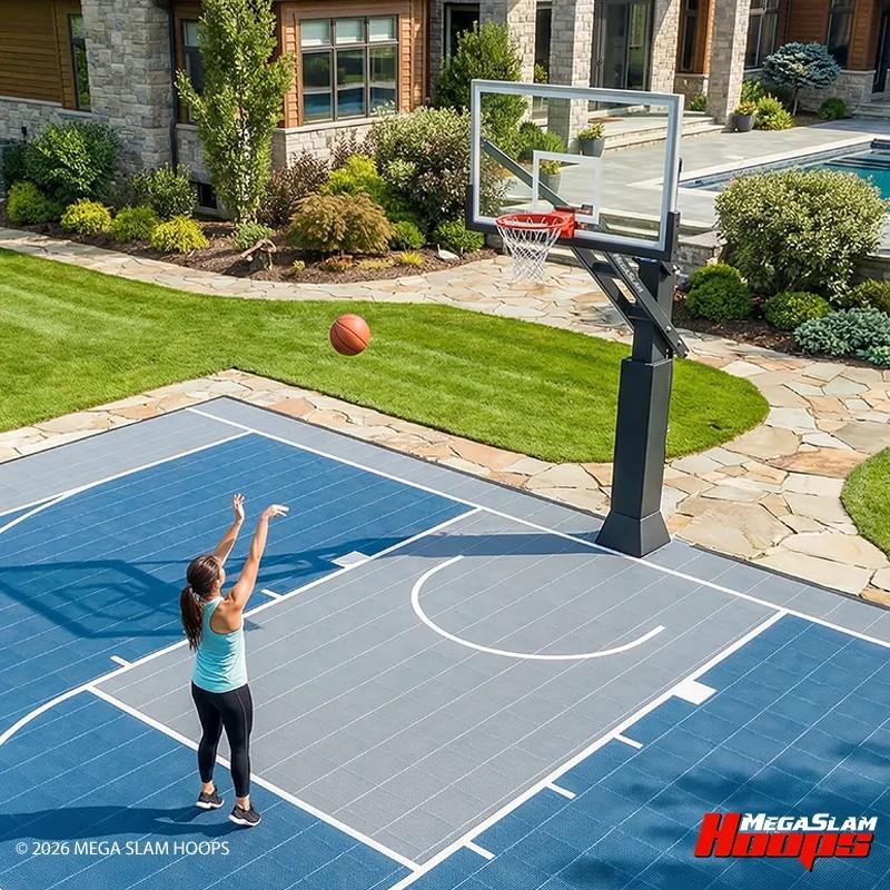 Full backyard basketball court with sport tiles and a Mega Slam in-ground hoop