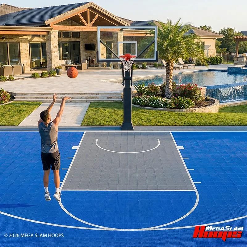 Landscaped backyard basketball court with a premium Mega Slam in-ground hoop
